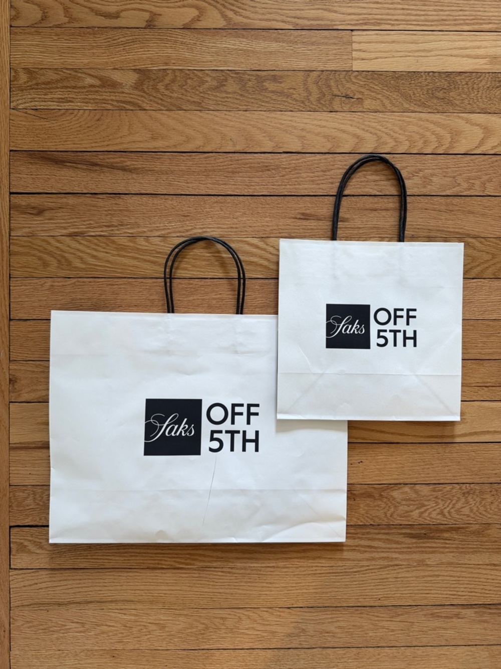 White Paper Shopping Bag with Black Handles Saks Off 5th medium and small